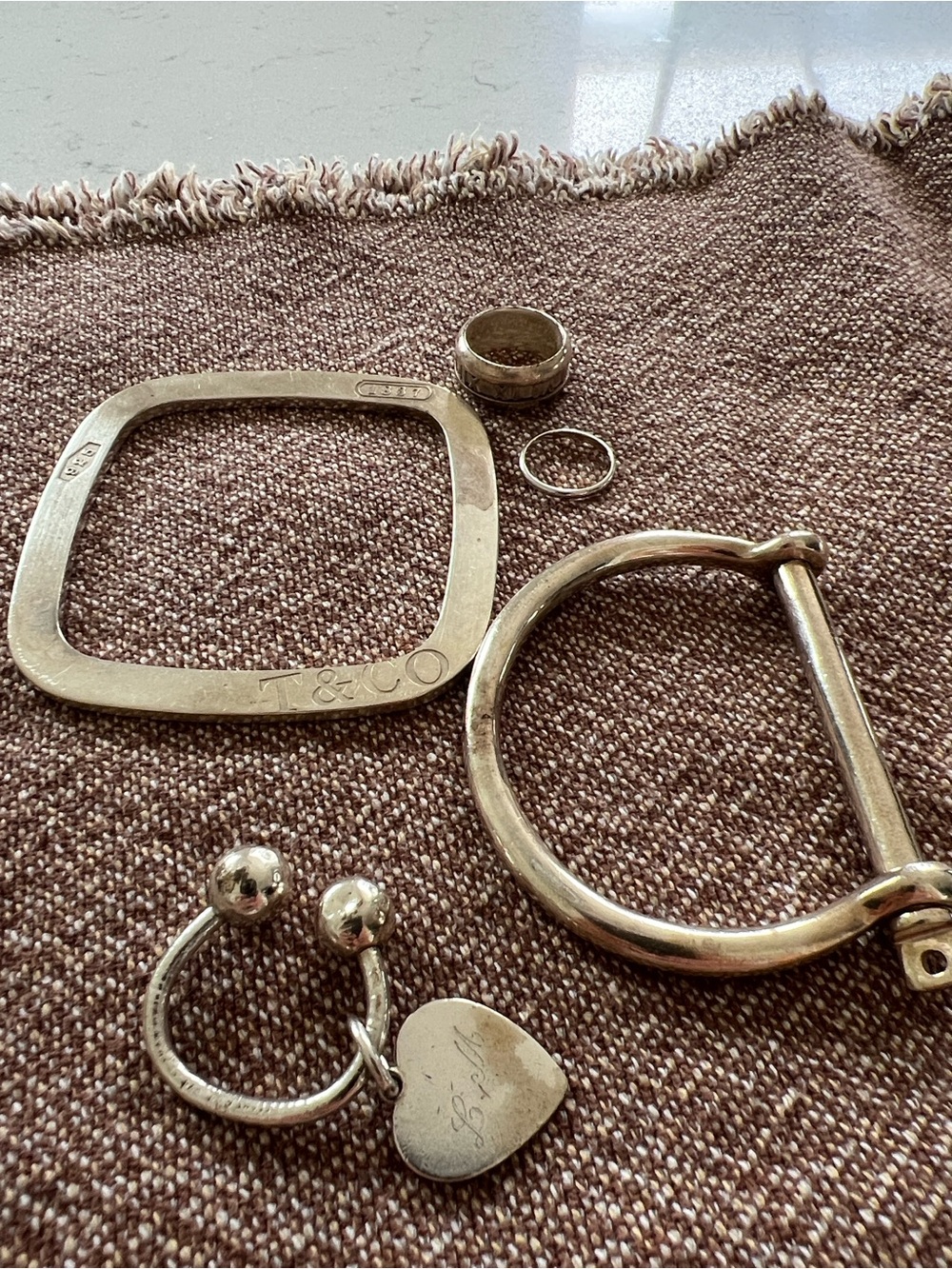 Tiffany & Co. Silver Bracelet, ring and key chain. Maiansai Silver bangle, ring